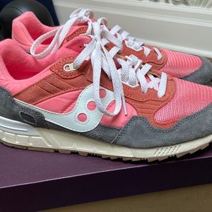 Pink and grey Saucony sneakers